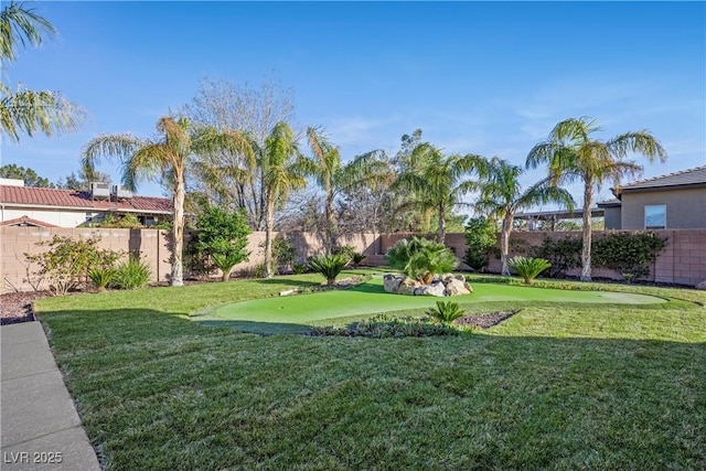 view of yard featuring a fenced backyard