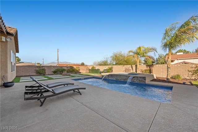 view of pool featuring a fenced in pool, a patio area, and a fenced backyard