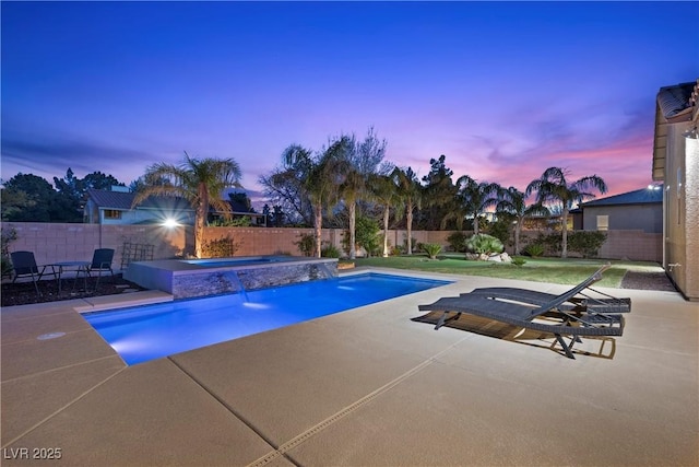 view of pool with a fenced in pool, a patio area, a fenced backyard, and an in ground hot tub