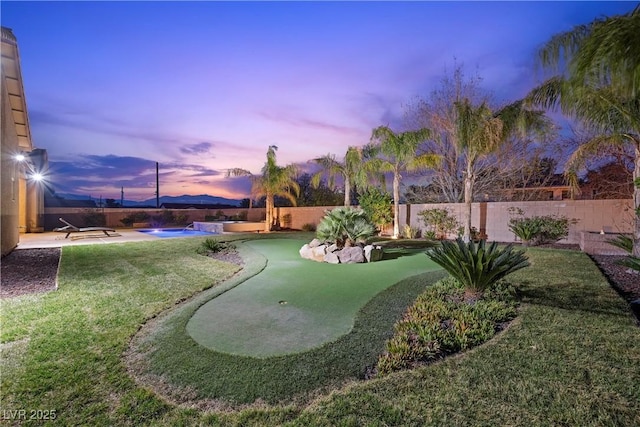 surrounding community featuring a fenced backyard, a yard, and a patio