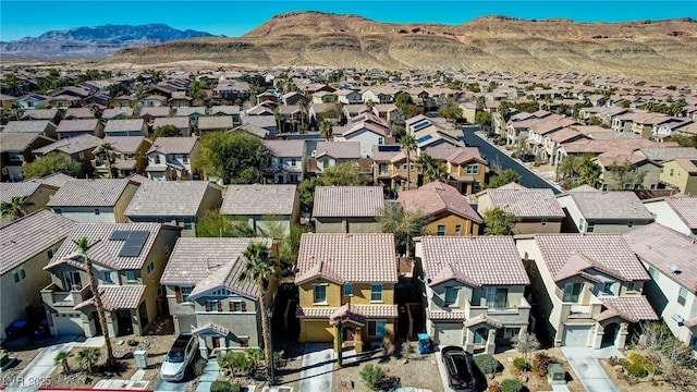 aerial view with a mountain view and a residential view