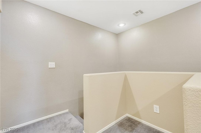 bathroom with baseboards and visible vents