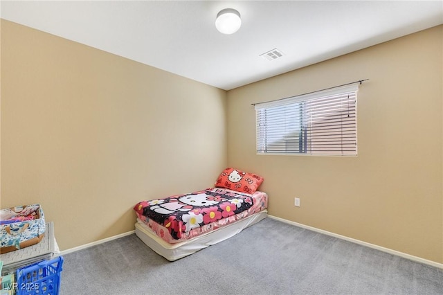 bedroom featuring carpet, visible vents, and baseboards