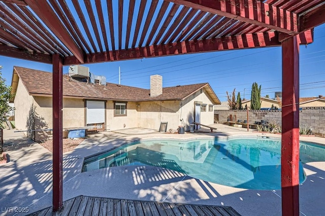 view of pool featuring a patio area, a fenced backyard, a fenced in pool, and a pergola