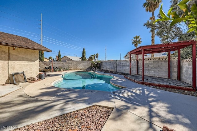 view of swimming pool with a fenced in pool, a fenced backyard, a patio, and a pergola