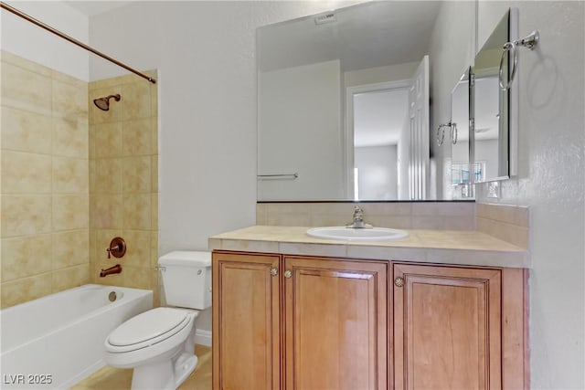 full bathroom with toilet, washtub / shower combination, and vanity