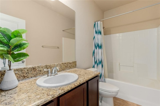 bathroom featuring shower / tub combo, vanity, toilet, and tile patterned floors