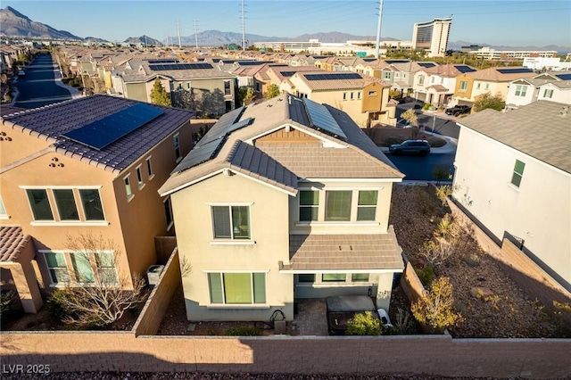 exterior space featuring a residential view and a mountain view