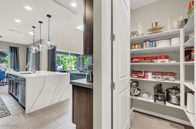 pantry with a sink