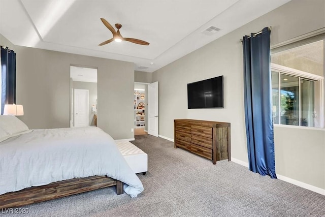 bedroom with baseboards, visible vents, ceiling fan, and carpet flooring