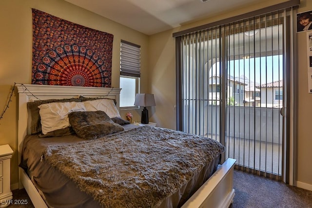 bedroom featuring carpet floors and access to exterior