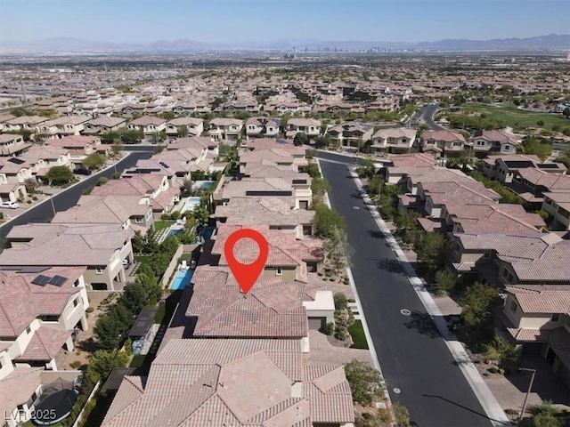 bird's eye view with a residential view and a mountain view