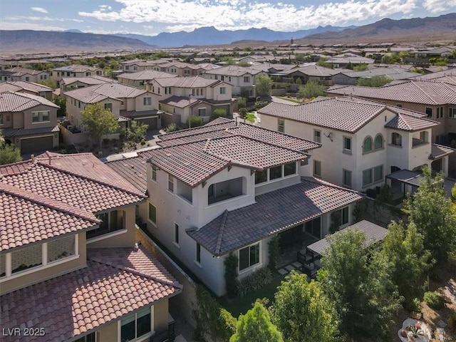 bird's eye view featuring a residential view and a mountain view