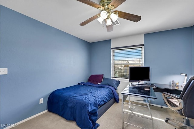 bedroom featuring light carpet, a ceiling fan, visible vents, and baseboards