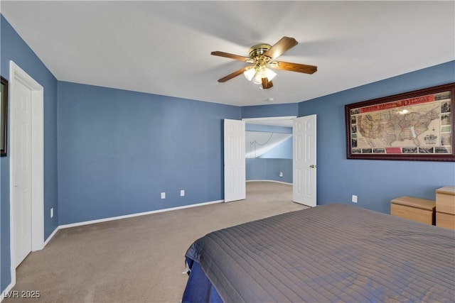 unfurnished bedroom featuring ceiling fan, carpet flooring, and baseboards