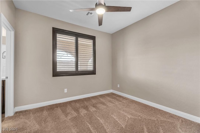 unfurnished room featuring ceiling fan, carpet flooring, visible vents, and baseboards