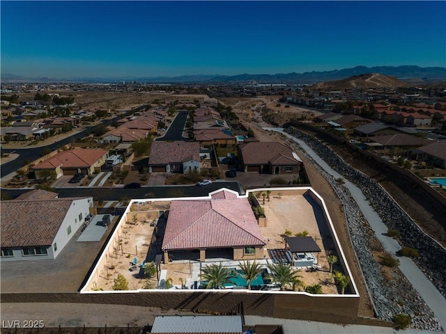 aerial view with a residential view and a mountain view