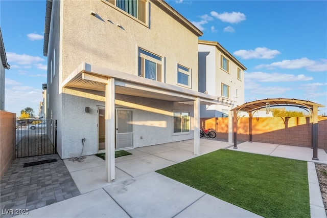 view of patio / terrace featuring a fenced backyard and a pergola