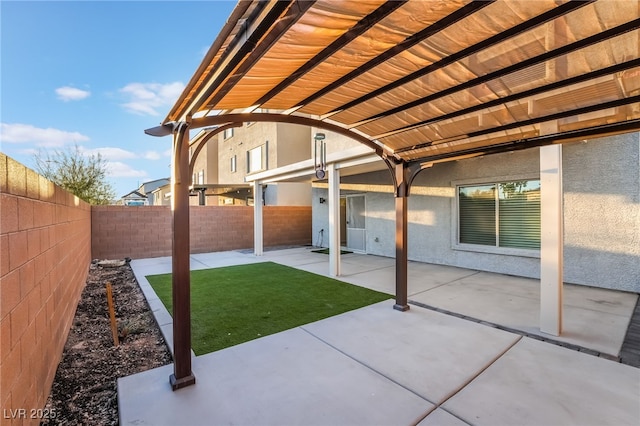 view of patio with a fenced backyard