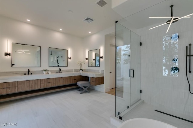 full bath with double vanity, a stall shower, visible vents, and recessed lighting