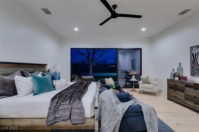 bedroom featuring ceiling fan, wood finished floors, visible vents, and recessed lighting