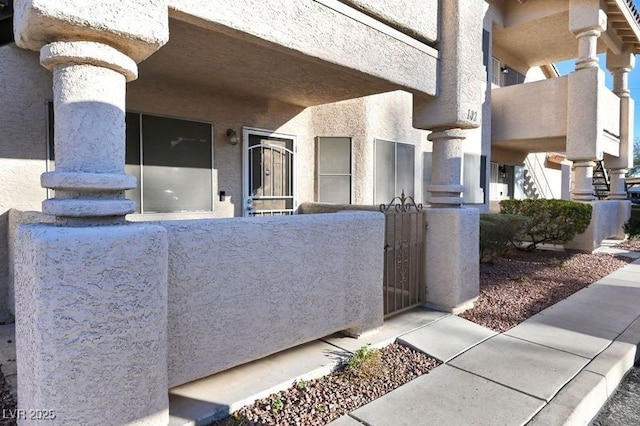 exterior space with stucco siding