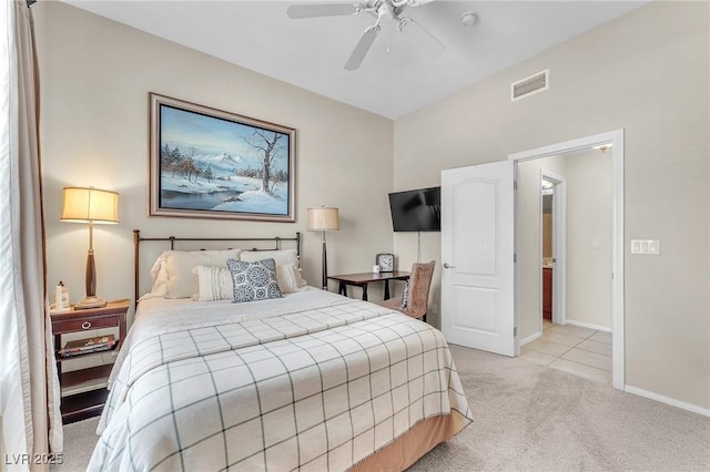 bedroom with light carpet, baseboards, visible vents, and ceiling fan