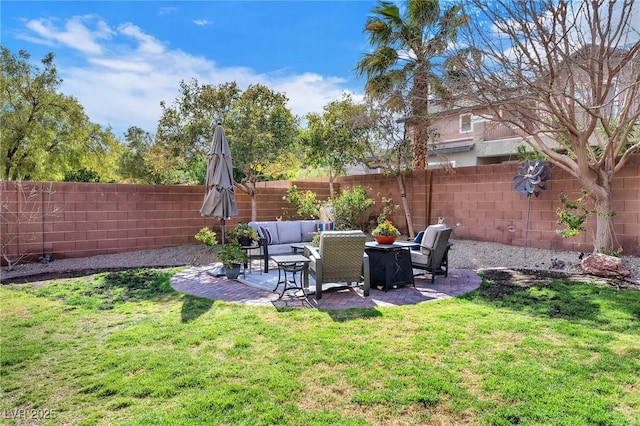 view of yard with a fenced backyard, a patio, and an outdoor hangout area