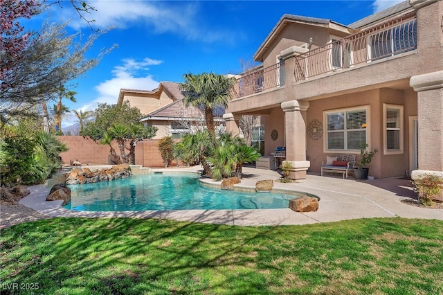 view of pool with a fenced in pool, a yard, fence, and a patio