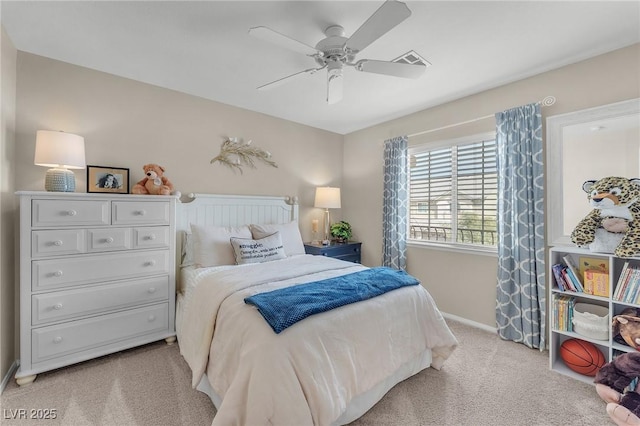 bedroom with a ceiling fan, visible vents, light carpet, and baseboards