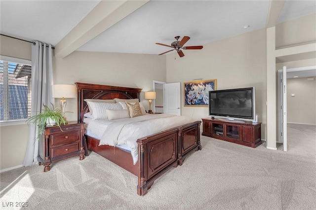 bedroom with light carpet, lofted ceiling with beams, baseboards, and a ceiling fan