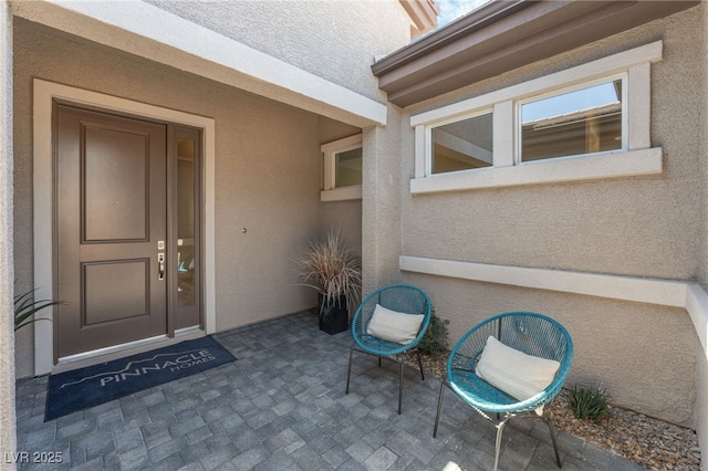 6312 Zephyr Ct, Las Vegas, NV 89149 - doorway to property with stucco siding