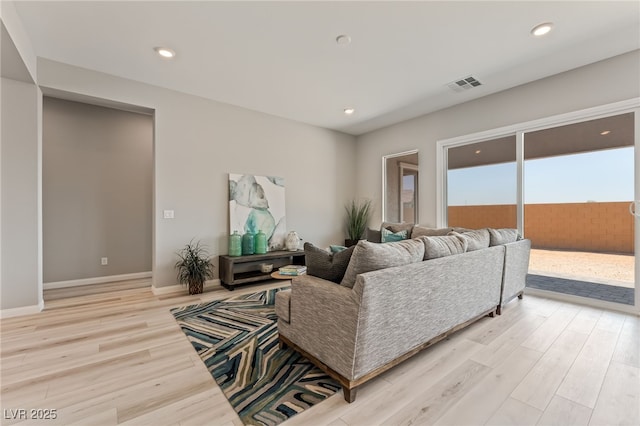 6312 Zephyr Ct, Las Vegas, NV 89149 - living area featuring light wood-style flooring, recessed lighting, and baseboards
