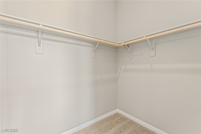 6312 Zephyr Ct, Las Vegas, NV 89149 - spacious closet featuring light carpet