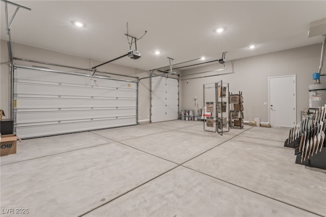 6312 Zephyr Ct, Las Vegas, NV 89149 - garage with a garage door opener, recessed lighting, and water heater