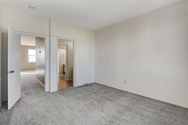 unfurnished bedroom featuring carpet