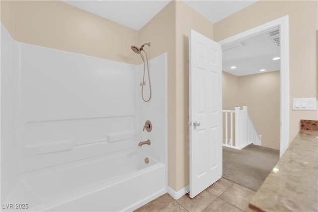 bathroom with bathing tub / shower combination and tile patterned floors