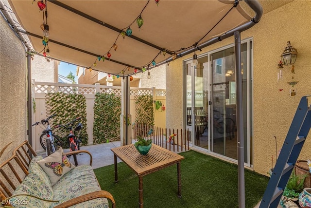 view of patio / terrace with fence