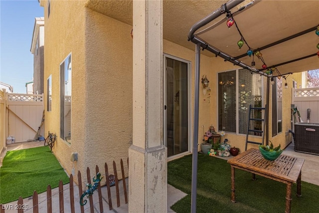 view of patio / terrace featuring fence