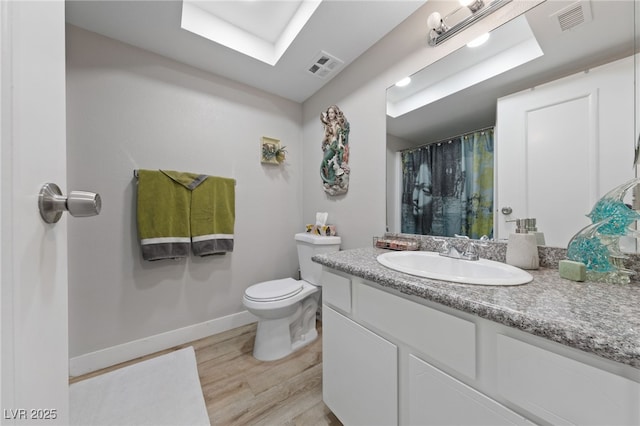 full bath featuring visible vents, toilet, baseboards, and wood finished floors