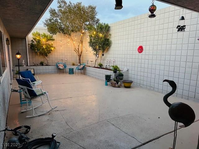 view of patio / terrace with fence