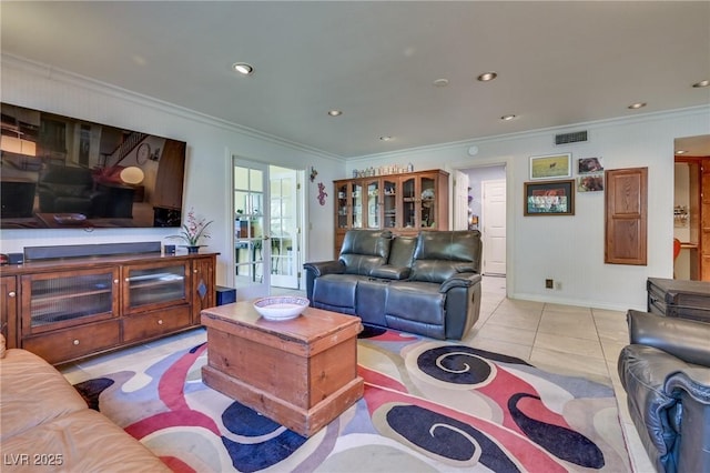 living room with recessed lighting, light tile patterned flooring, crown molding, and visible vents