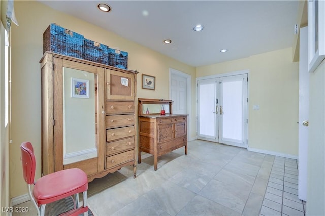 entryway featuring recessed lighting, baseboards, and french doors