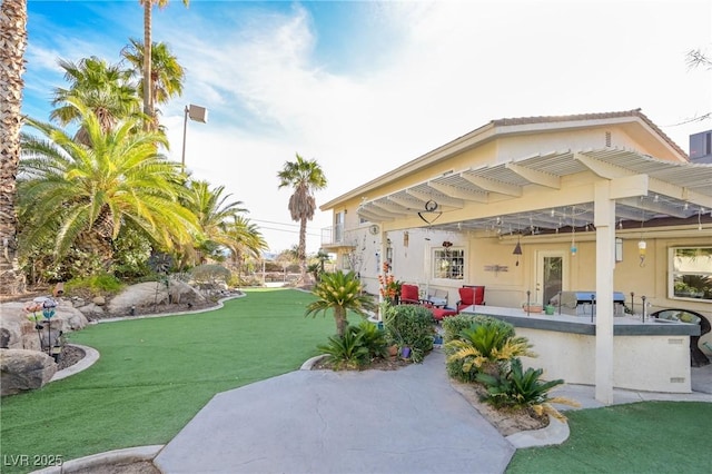 view of yard with a patio and a pergola