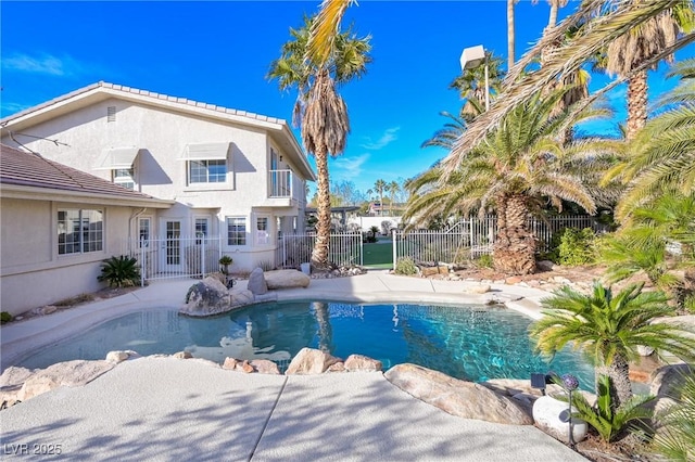 view of swimming pool with a fenced in pool, a gate, and fence