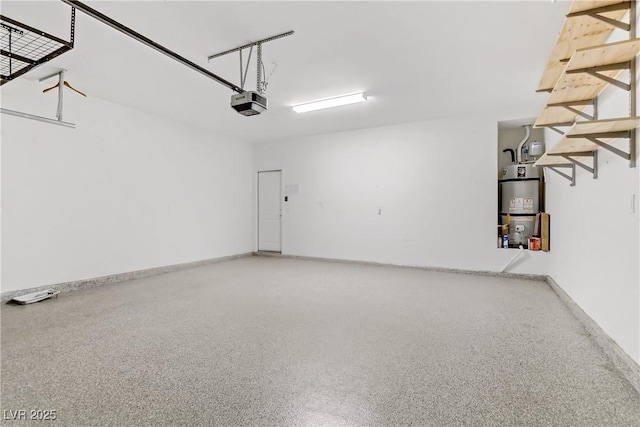 garage featuring water heater, baseboards, and a garage door opener