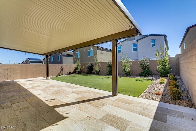 view of patio with a fenced backyard