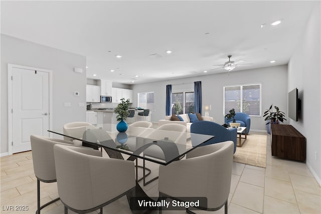 dining area with recessed lighting, light tile patterned flooring, ceiling fan, and baseboards