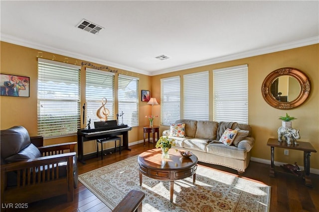 living room featuring crown molding, visible vents, and dark wood-style flooring