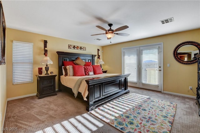 bedroom with light carpet, access to exterior, baseboards, and visible vents